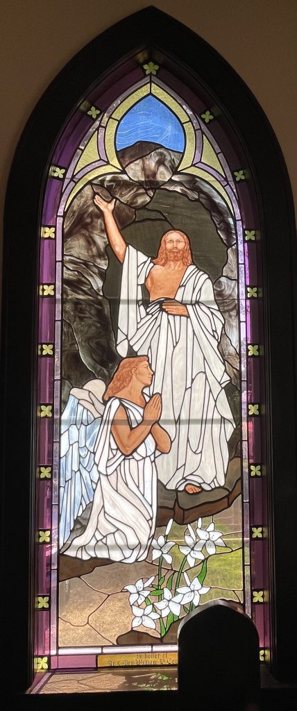 Stained glass window depicting Jesus' rebirth